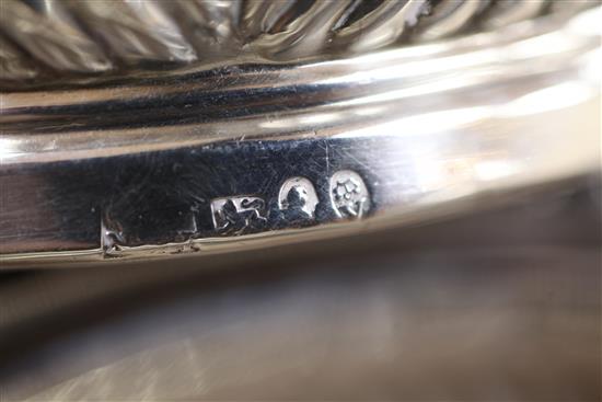 A pair of late George III silver coasters, approx. 6in.